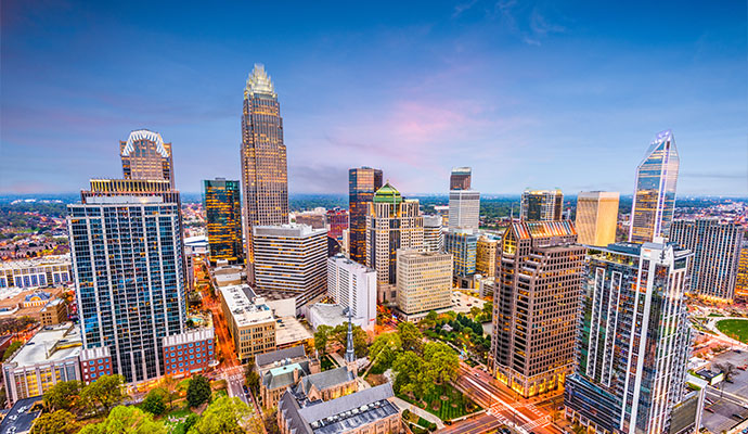 Charlotte, NC Skyline at Dusk Charlotte, NC skyline with buildings and city lights