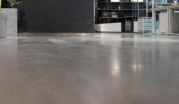 Professional concrete floor cleaning service Shiny clean and polished concrete floor after professional cleaning