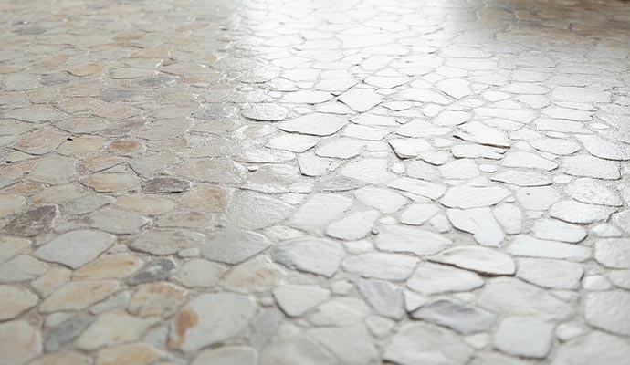 Professional stone floor cleaning service Shiny clean stone floor after professional cleaning