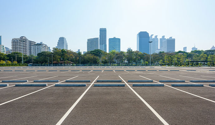 Parking lot cleaning with sweeping machine Parking lot cleaning using a professional sweeping machine